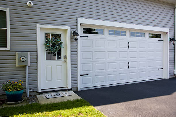 24/7 Emergency Garage Door Panel Replacement experts in Canterwood, WA
